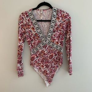 Free People long sleeve bodysuit.